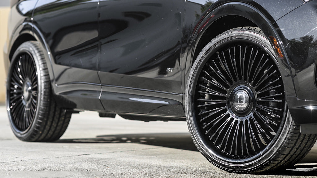 24" Dolce Luxury Wheels Razzo Matte Black Face with Gloss Black Lip Floating Cap Rims